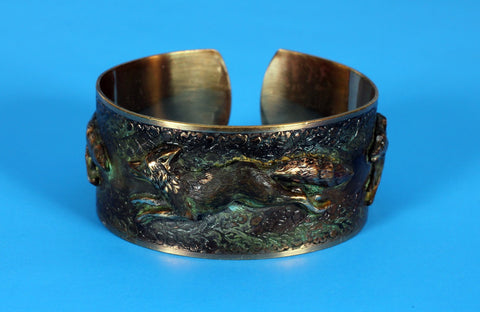 three running foxes on hand-crafted solid brass cuff in an earth patina